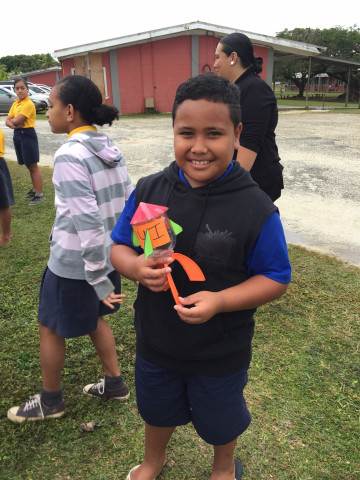 Child holding rocket
